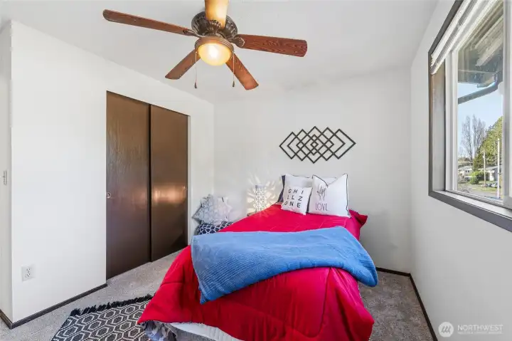 Comfortable third bedroom providing added flexibility.