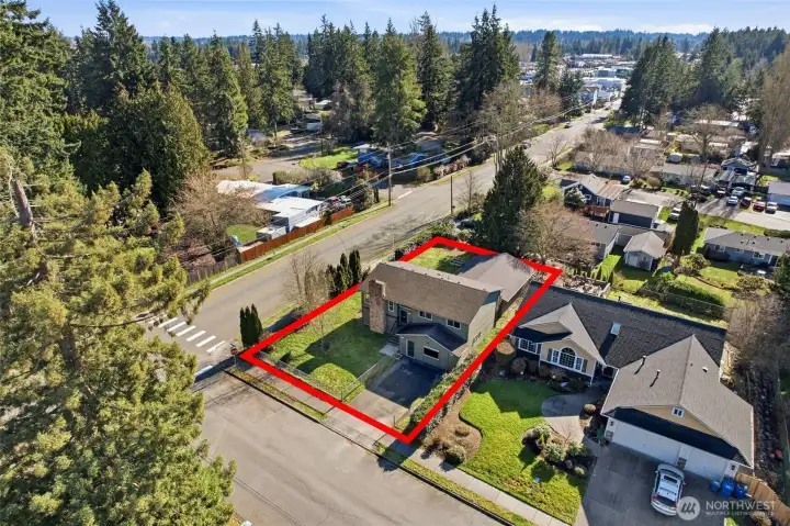 Aerial view highlighting the property’s generous lot size and boundaries