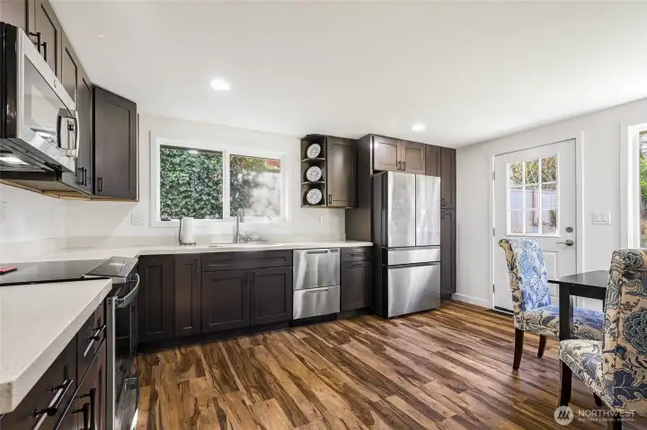 Beautifully updated kitchen with new cabinets, countertops and appliances.