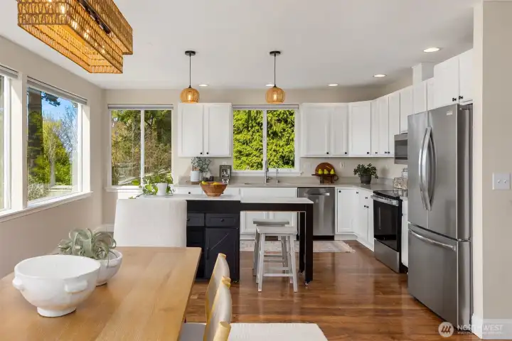 Large kitchen with S/S appliances.