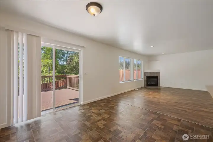 LIVING ROOM GOING INTO THE BACKYARD/BACK DECK