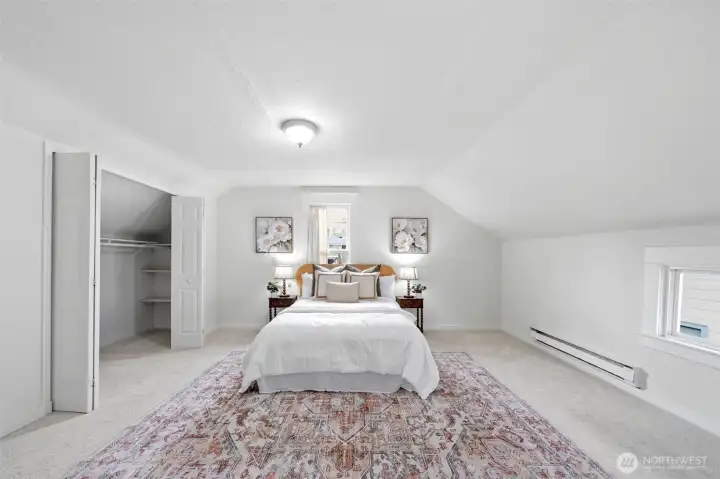 Light-filled and spacious primary bedroom with character and room to unwind