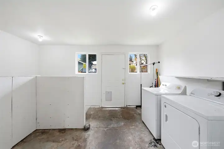 Laundry and mud room with exterior access, offering added functionality and everyday convenience
