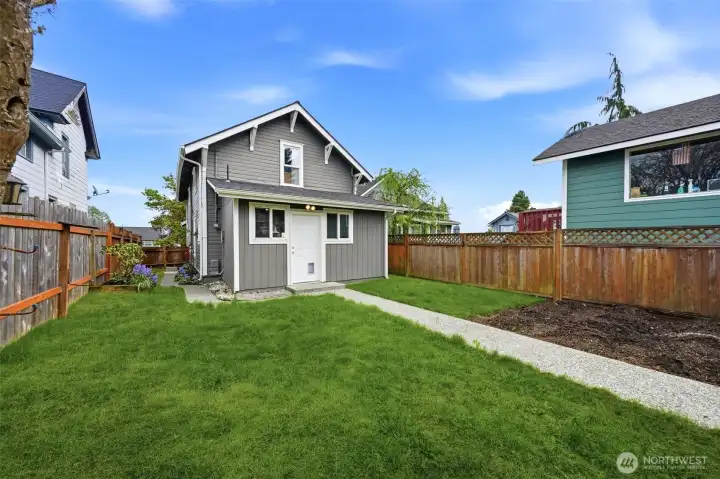 Spacious, usable yard with garden-ready space to create your ideal outdoor retreat