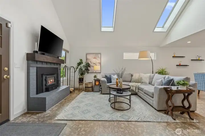 Vaulted ceiling w/skylights in Open Living Room