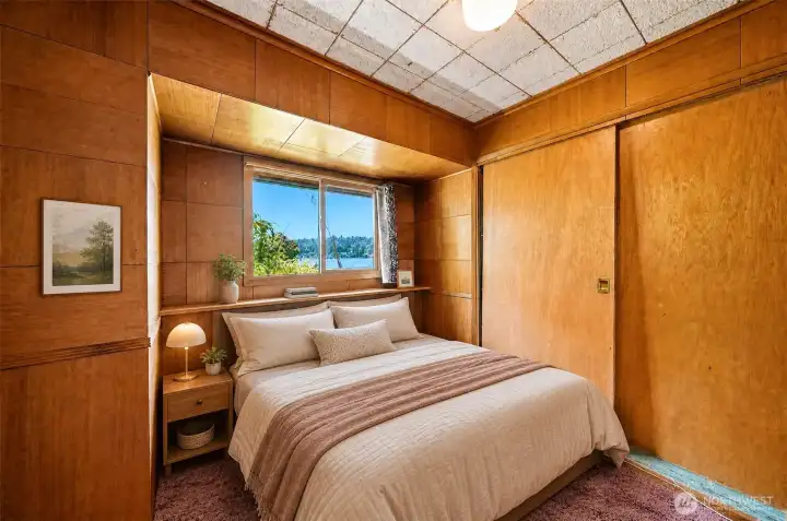 Bedroom 2, with great water views. Virtually staged