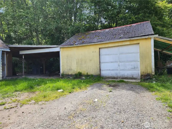 Garage with lean - to could be a great wood shed Garage with lean - to could be a great wood shed