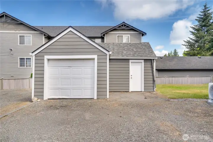 The detached garage gives you a covered parking spot, while the attached shed adds convenient extra storage.