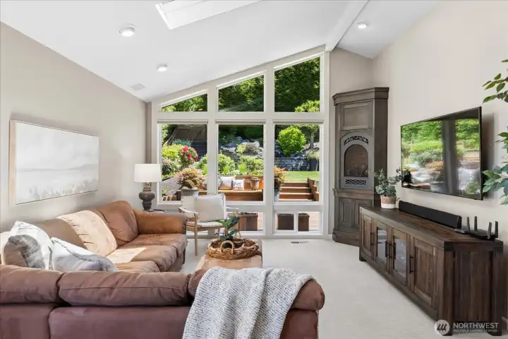 Wow! Floor to ceiling window and gas fireplace in family room