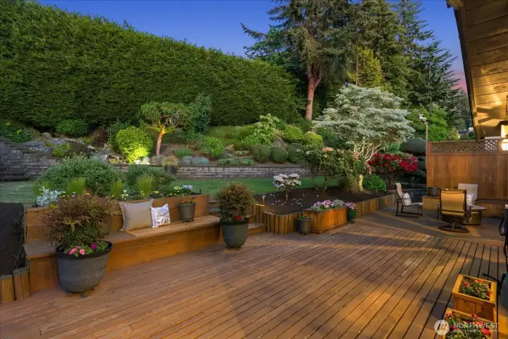 Dreamy deck and yard with established landscaping