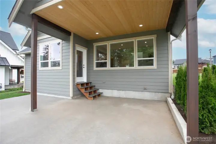 The covered back patio will be great for outdoor entertaining.