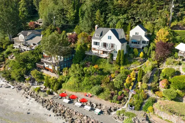 Experience the unparalleled beauty of Pacific Northwest coastal living and an effortless commute to one of the world's most beautiful and vibrant cities. This home is an in-city retreat where nature meets maritime activity. Rare 80 feet of waterfront, plus tidelands situated on serene Puget Sound.