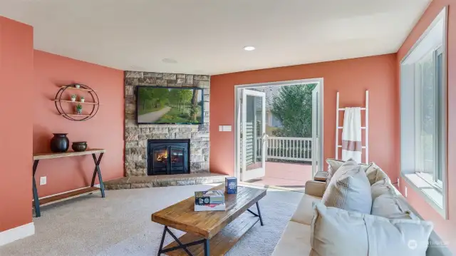 Family room is off the kitchen and takes advantage of lovely backyard views.