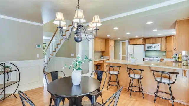 Continuing inside to the heart of the home in this open kitchen and dining space, ideal for entertaining!