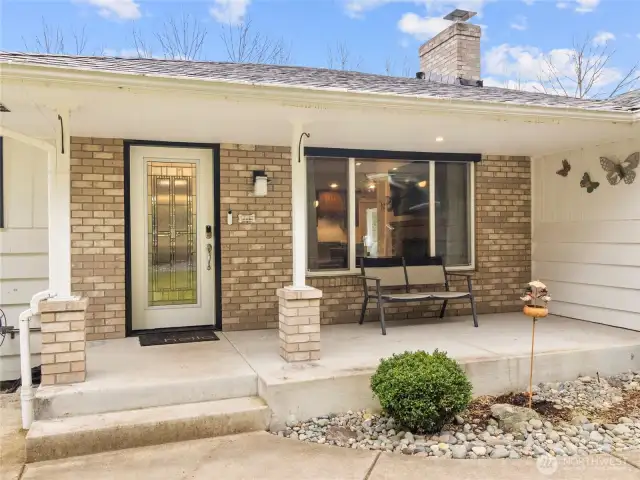 Covered front porch to decorate for the holidays, or enjoy a cup of coffee with the sunrise.