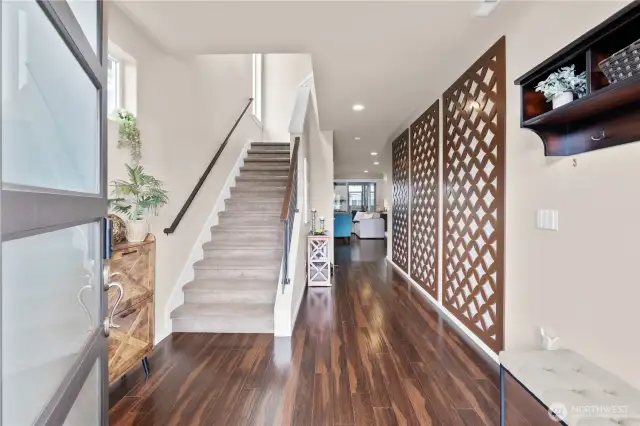 entry with custom art on wall