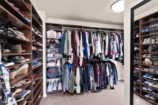 custom closet organizer in primary room