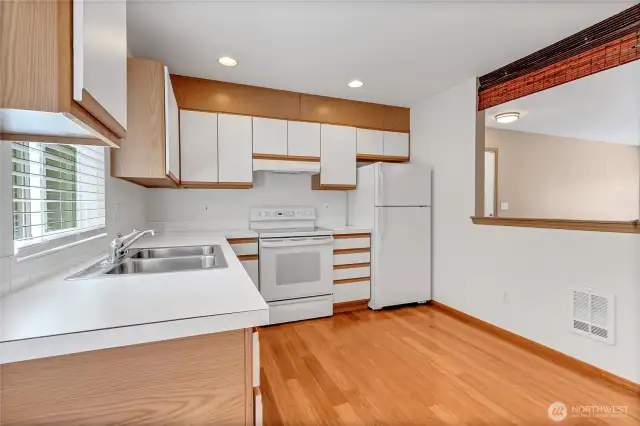 The open kitchen design flows directly into the main living space.