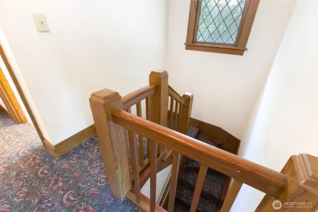 Original wood banister.