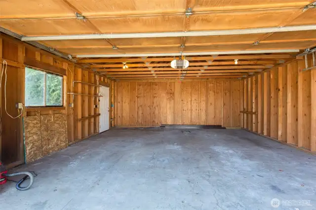 Plenty of room for two cars and possibly a workbench and cabinets in the garage.