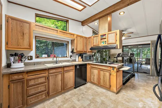 Large open kitchen with eat in dining