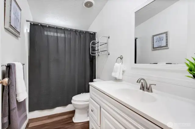 2nd full bath down hallway for 2 bedrooms and guests