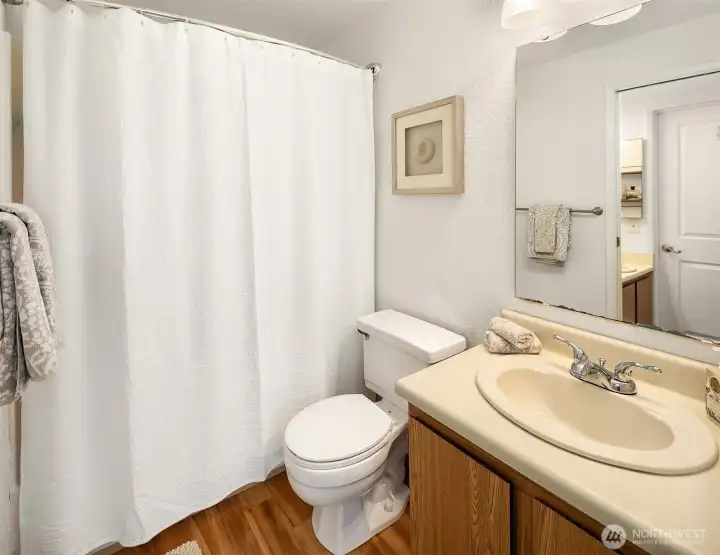 Full bathroom with 1 of 2 sinks.
