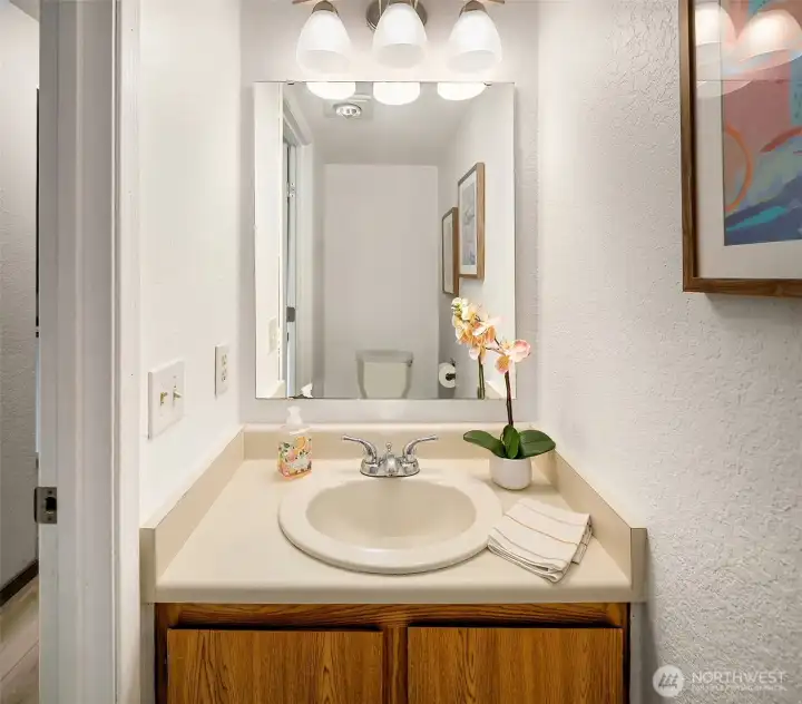 Powder room off of entry.