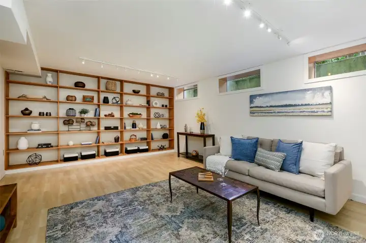 Spacious Family room with built-in bookcases.