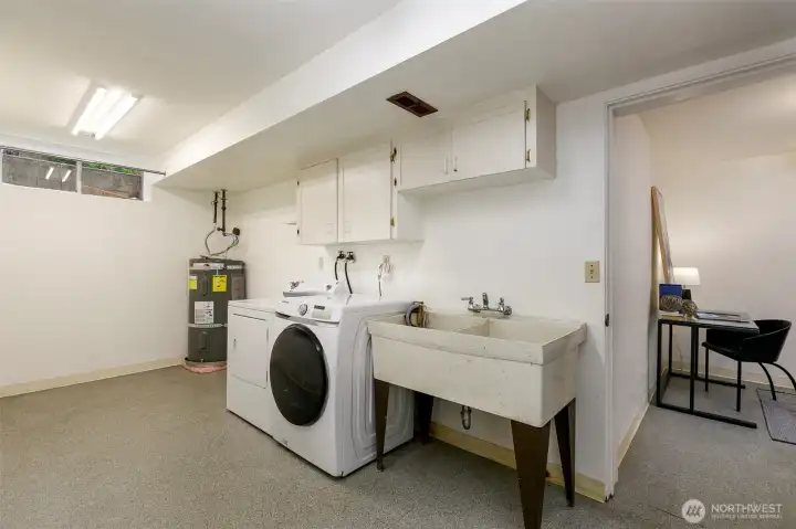 This Broadview home features a spacious laundry room with sink.