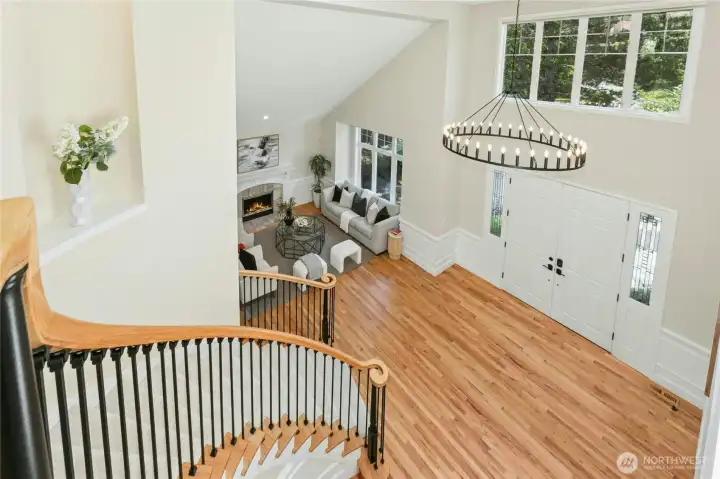 Light-filled interiors, soaring ceilings, and refined detailing, including crown molding, tray ceilings, custom millwork, and art alcoves.
