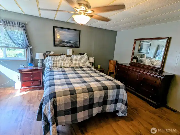 Primary bedroom with ceiling fan