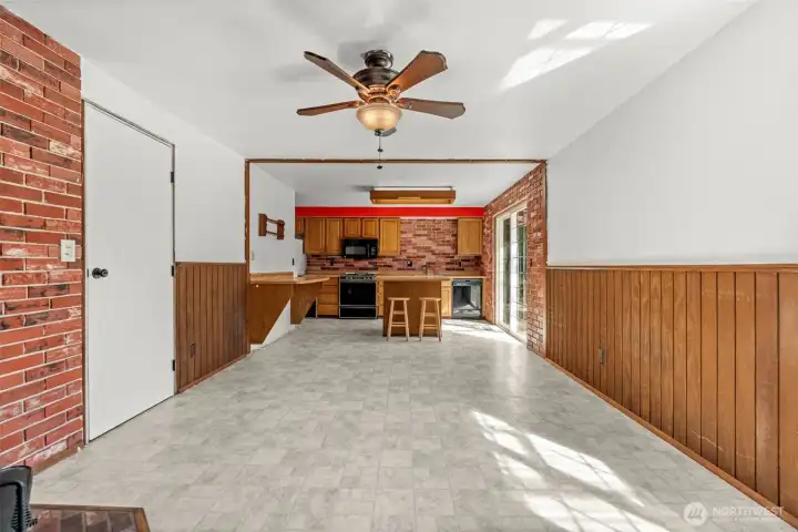 Gather in the large dining room or kitchen nook, designed to comfortably host ample guests for every occasion.