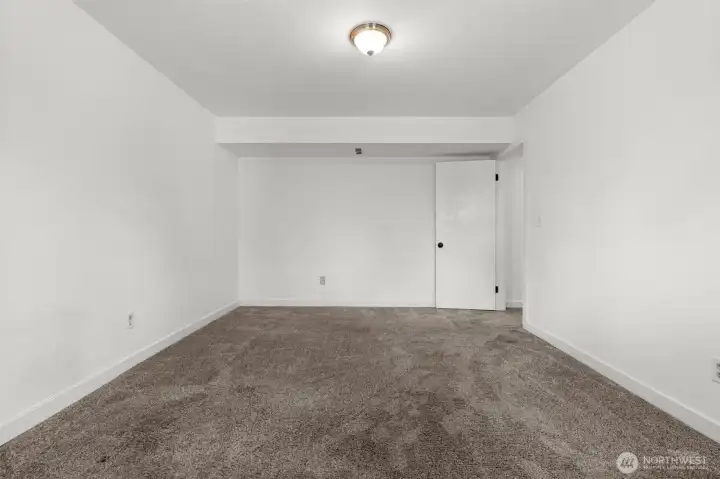 The last room in the house opens directly to the backyard, providing the perfect setting for a home office, media room, or flexible living space to fit your needs.