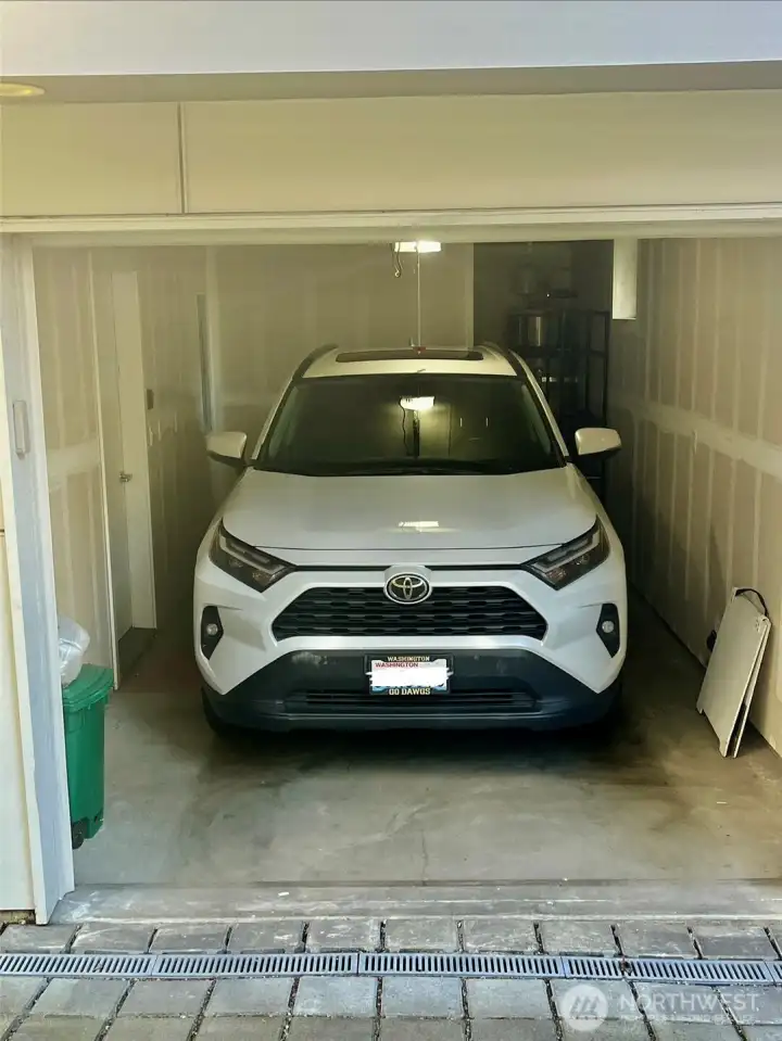 Garage fits a normal sized SUV with more room than you might think.