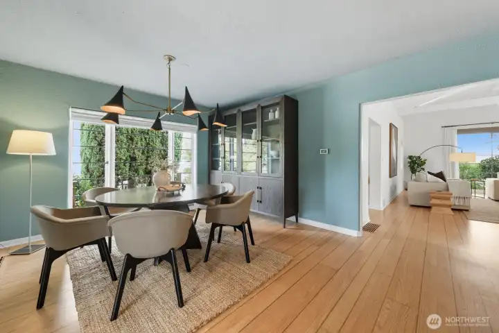 The dining room flows naturally from the living room and the entryway. The Restoration Hardware hutch in the photo conveys with the home!