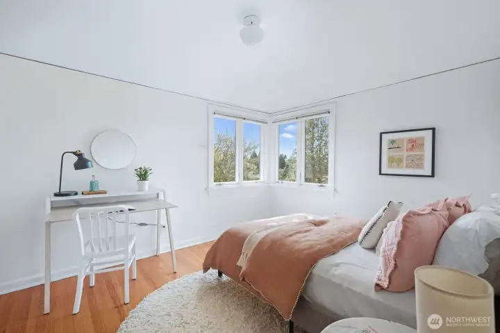 Second bedroom upstairs with views of Lake Washington. There is an extra large closet in this room that also has it's own window.