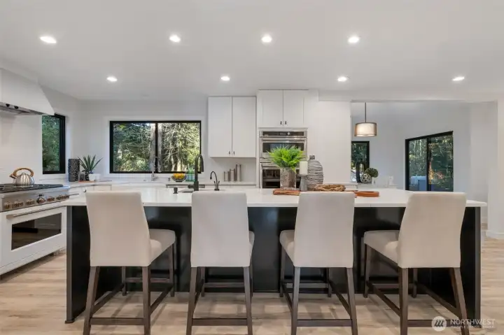 Remodeled kitchen with luxury quartz countertops and "Cafe" appliances
