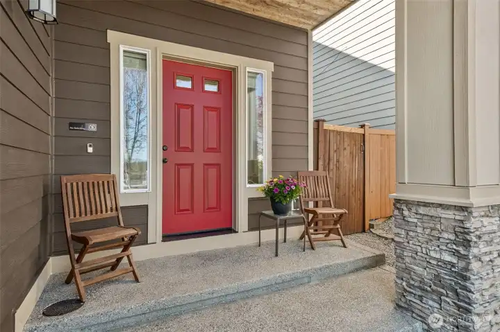 We love this welcoming covered front porch! It's the perfect place for some peace, gazing across the street at the farm with the Cascade Mountain range in the background!