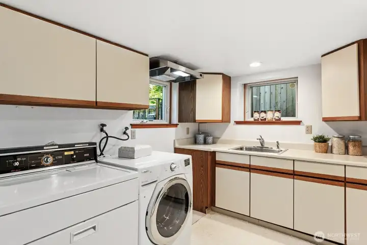 Kitchenette in basement and the washer/dryer.  Stove/oven has been removed.