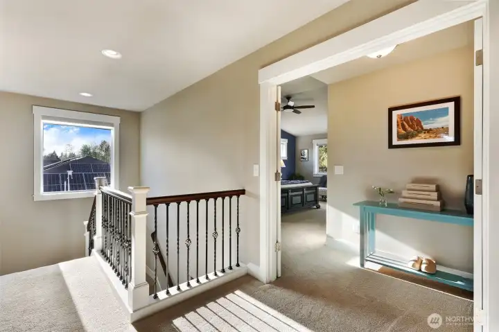 Upper landing and entrance to primary suite