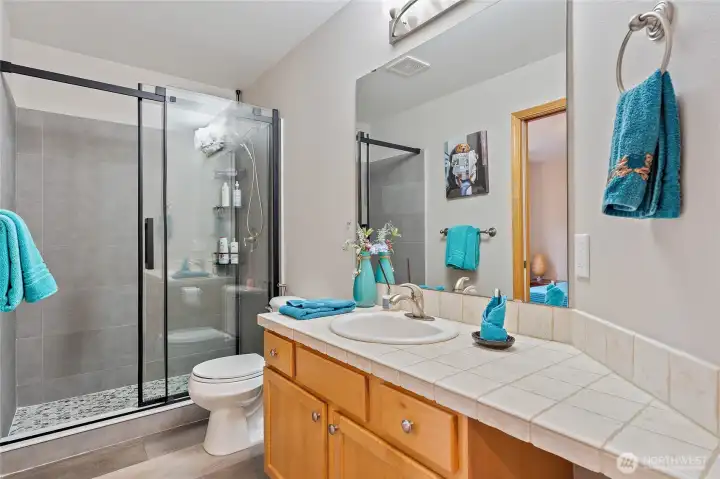 Lower level bath, attached to bedroom