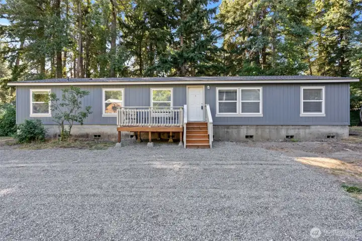Front of home with deck