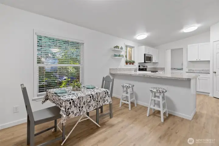Second dining area with kitchen island