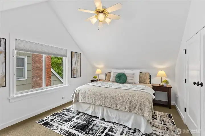 Primary suite with vaulted ceilings