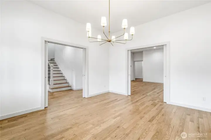 Pocket doors maximize the space, creating a seamless flow between rooms. Pocket doors maximize the space, creating a seamless flow between rooms.