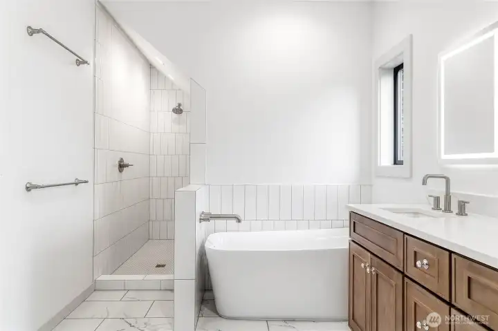 Primary en-suite, with private commode room. Primary en-suite, with private commode room.
