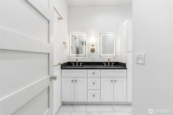 Full bathroom next door to Bedroom #3 on upper level Full bathroom next door to Bedroom #3 on upper level