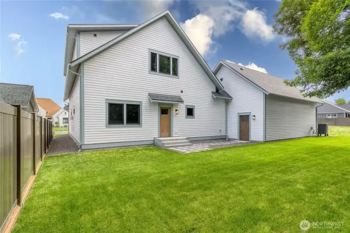 Spacious back yard with mature trees along fence line providing just the right amount of sun and shade. Spacious back yard with mature trees along fence line providing just the right amount of sun and shade.