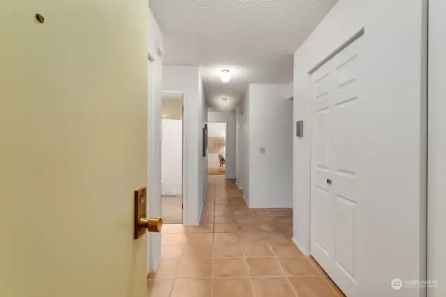 Spacious entry lined with expansive closets.